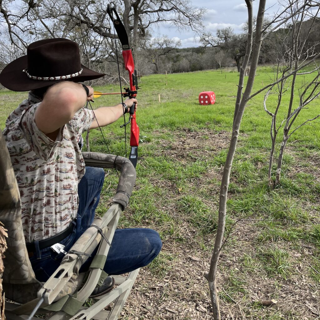 Shooting from a tree stand on an Archery Range